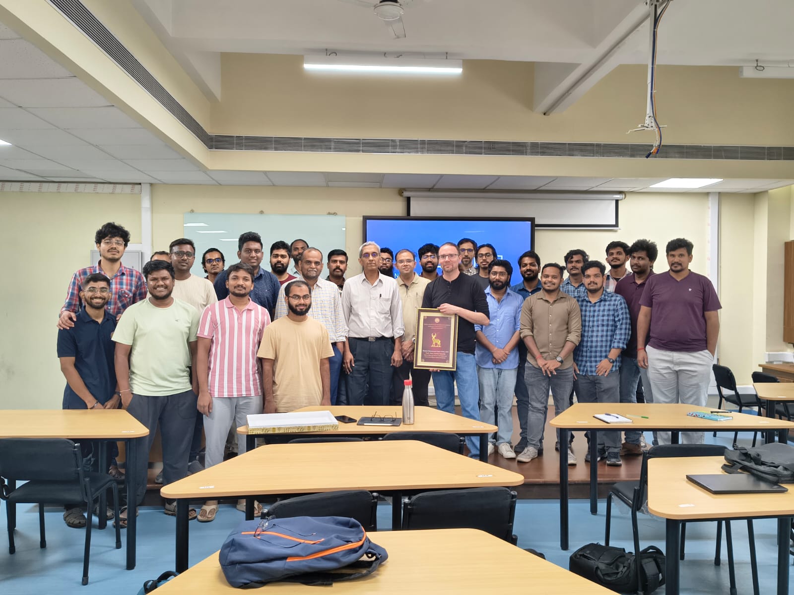 Assistant Professor&nbsp;Jean-Charles Stinville pictured with students at IIT Madras as he receives grant honors.