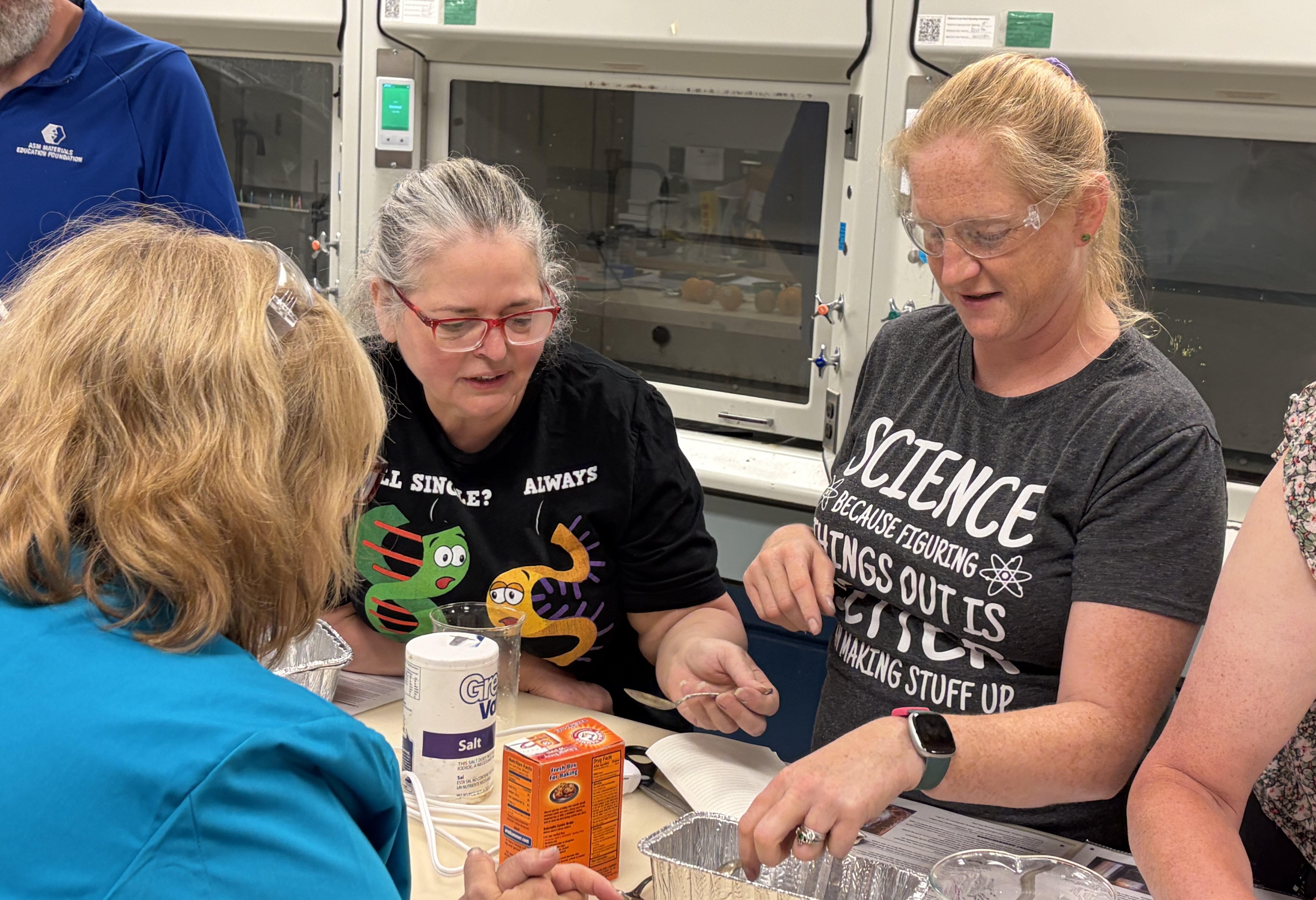 Pictured: Sherri Rukes working with several other teachers during an experiment at the 2026 ASM Materials Camp for Teachers.