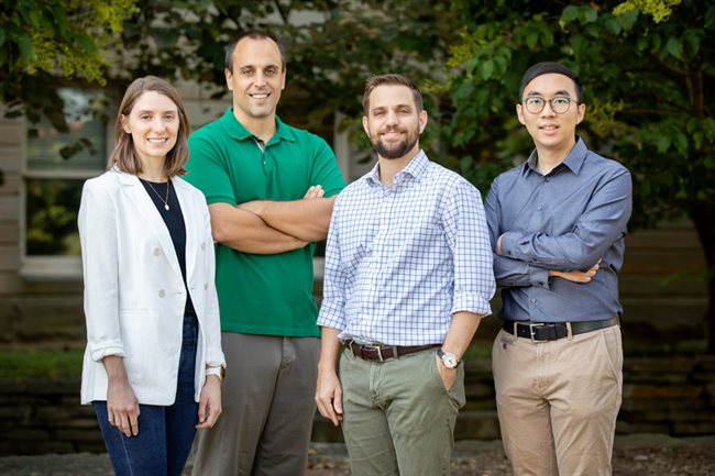 University of Illinois researchers have developed a new ultrathin waterproof coating with self-healing abilities that may help steam power plants run more efficiently in the future. From left, graduate student Ellie Porath, professor Nenad Miljkovic, professor Christopher Evans and graduate research assistant Jingcheng Ma. Photo by L. Brian Stauffer
