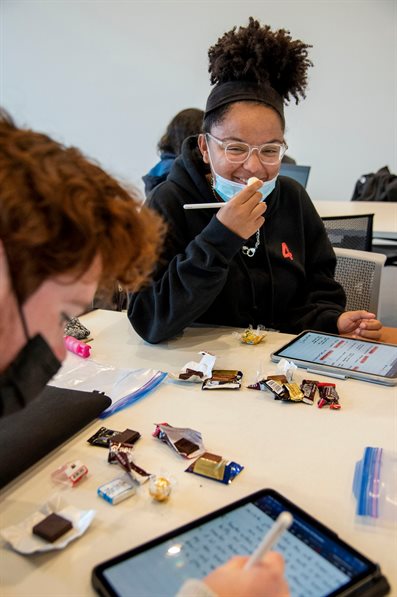 Heather Coit/The Grainger College of Engineering&lt;br /&gt;An MSE182 student is all smiles while trying some of the chocolate confections during the materials science of chocolate lecture at the Campus Instructional Facility on Oct. 14.
