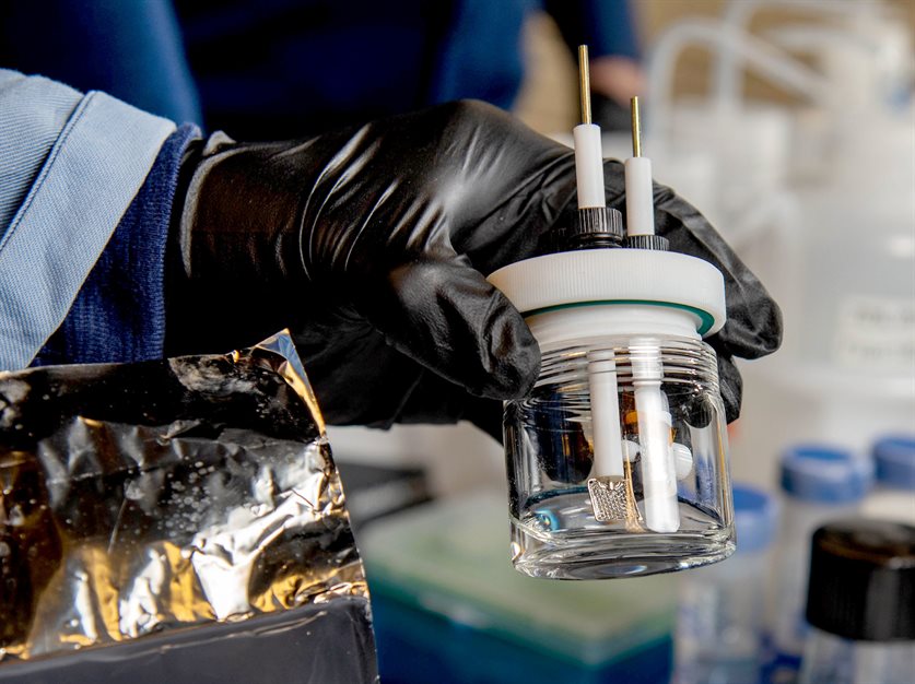 The test cell, right, contains the lithium-extracting material, held by Zahiri in the Engineering Sciences Building in Urbana, Ill. on Feb. 23, 2022. The researchers were working with samples formed into a LiCoO2 (LCO) membrane. In the lower left, a sheet of LCO-coated metal is used as part of the study to selectively extract lithium ions from the geothermal brine.&amp;amp;nbsp;