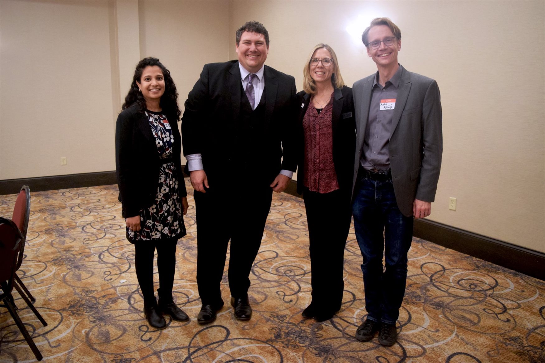 MatSE alumnus Ryan Haggerty, second from left, is all smiles after receiving the Young Alumni Award at the Holiday Inn in Champaign, Ill. on April 21. Posed with him are Zeba Parker, left, a MatSE alumna; Nancy Sottos, third from left, MatSE's department head, Swanlund Endowed Chair and Center for Advanced Study Professor; and Andr&amp;amp;amp;amp;amp;amp;amp;amp;amp;amp;eacute; Schliefe, MatSE associate professor.