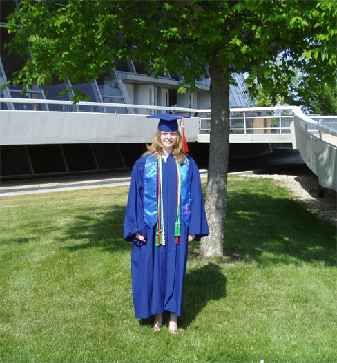 Marie Mayer poses for a photo in her graduation regalia outside Assembly Hall, now the State Farm Center, in 2007. The MatSE alumna is now the director of QuantumScape, a solid-state lithium-metal battery company.