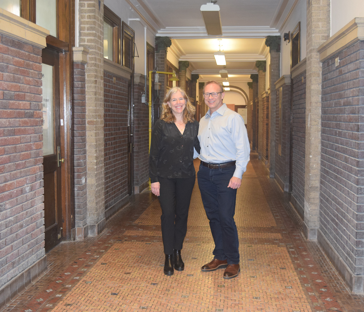 MatSE alumni Amanda and Darrin Hansen pose in the first floor of the Ceramics Building in Urbana, Ill. on April 27. The couple met at UIUC during their graduate studies and now work together at Boeing. They had a recent "homecoming" traveling to UIUC to collaborate with several university faculty on an upcoming research effort. For Amanda Hansen, it was her first time back to her alma mater since graduating. Photos by Emily Jankauski, Grainger Engineering.