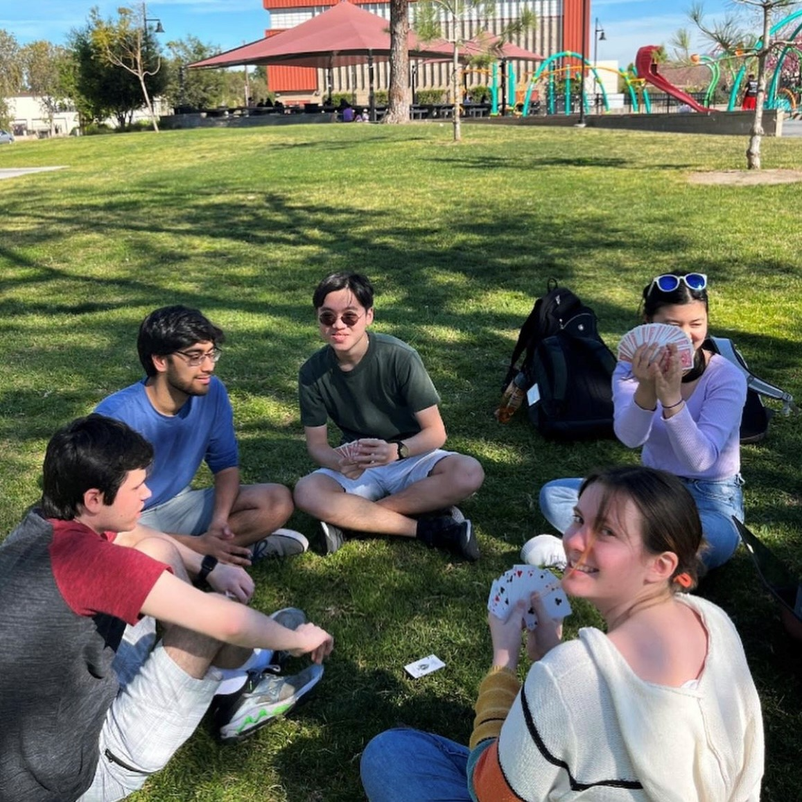 Current and former Material Advantage and&nbsp;Keramos executive board members play a card game. Pictured, from left, are: Justin Gruber, Shivam Tailor, Ray Tsai, Kira Martin and Kayla Haung.