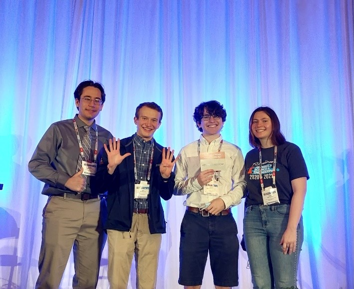 Material Advantage and Keramos members, including, from left, James Heaton, Ian Flueck, Noah Hanselman and Kira Marting, pose for a photo after competing in the 2022 Material Bowl during The Minerals, Metals &amp; Materials (TMS) Conference.