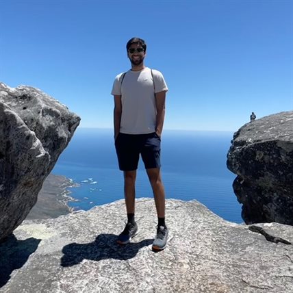 Shivam Tailor poses for a photo atop Table Mountain in Cape Town, South Africa during a study abroad trip taken over the winter break. The trip was all the more special for Tailor as South Africa is the birthplace of his aunt. He in turn hopes the experience will help him connect with his aunt's stories and have a better sense of her childhood.