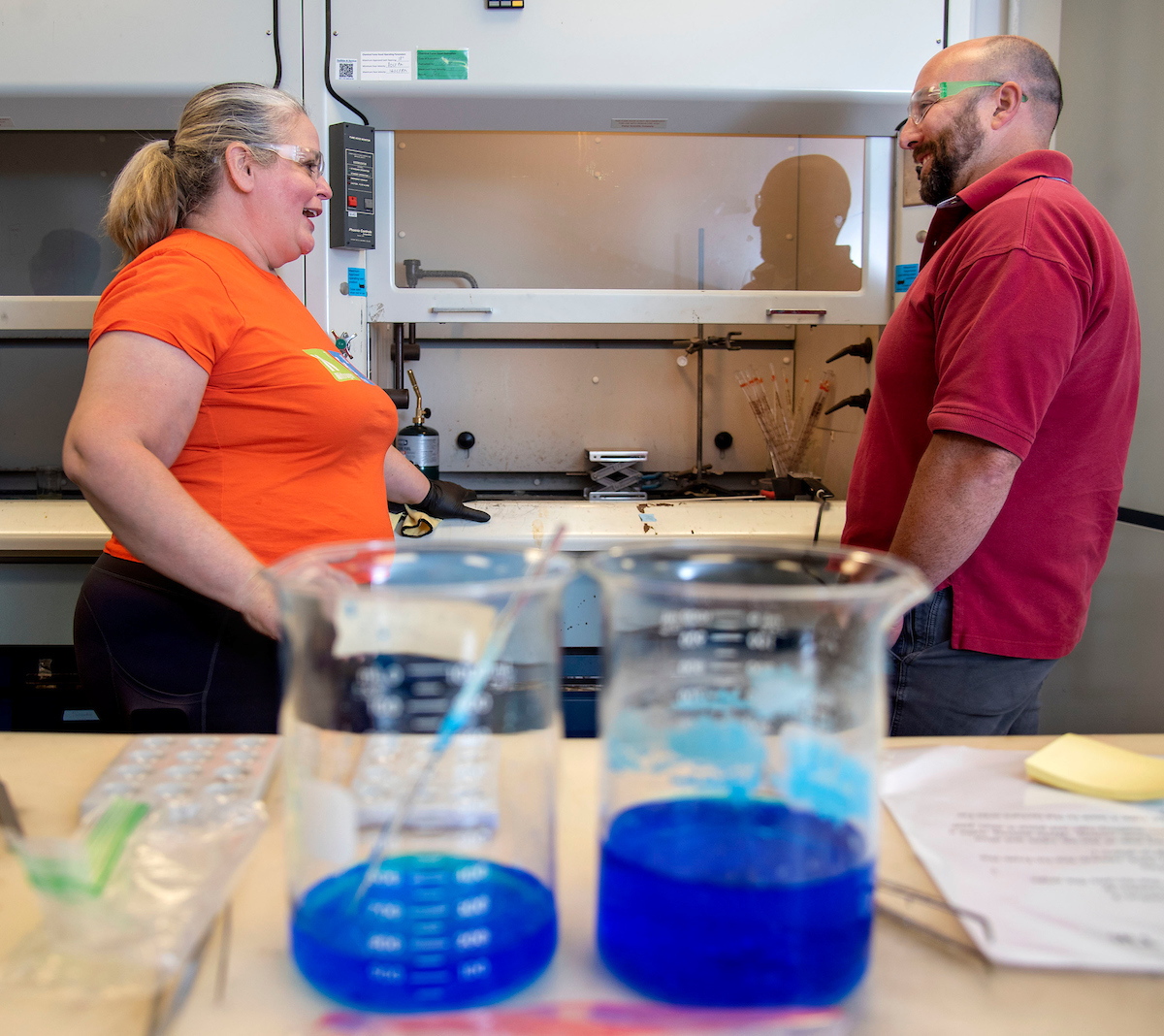 Master teacher Sherri Conn&amp;nbsp;Rukes, left, of Libertyville High School, chats with a teacher about materials science&amp;nbsp;at the Kiln House in&amp;nbsp;Urbana, Ill. on Tuesday, June 13, 2022.