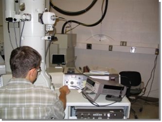 Khalid Hattar conducts beta testing of the original protochips microbricated heating transmission electron microscope, or TEM, stage in the basement of the Materials Research Lab at the University of Illinois Urbana-Champaign.