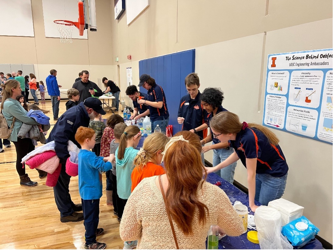 Engineering Ambassadors teach kindergarten through second-graders about oobleck and chemical reactions at a STEM Night at Middletown Prairie Elementary School in Mahomet, Ill. earlier in February. Ambassadors pictured, from left, are Cesar Mejia (ECE), Matthew Friar (Physics), Ian Kinsel (MechSE), Maya Miriyala (BioE) and Sara Pfeil (MatSE).