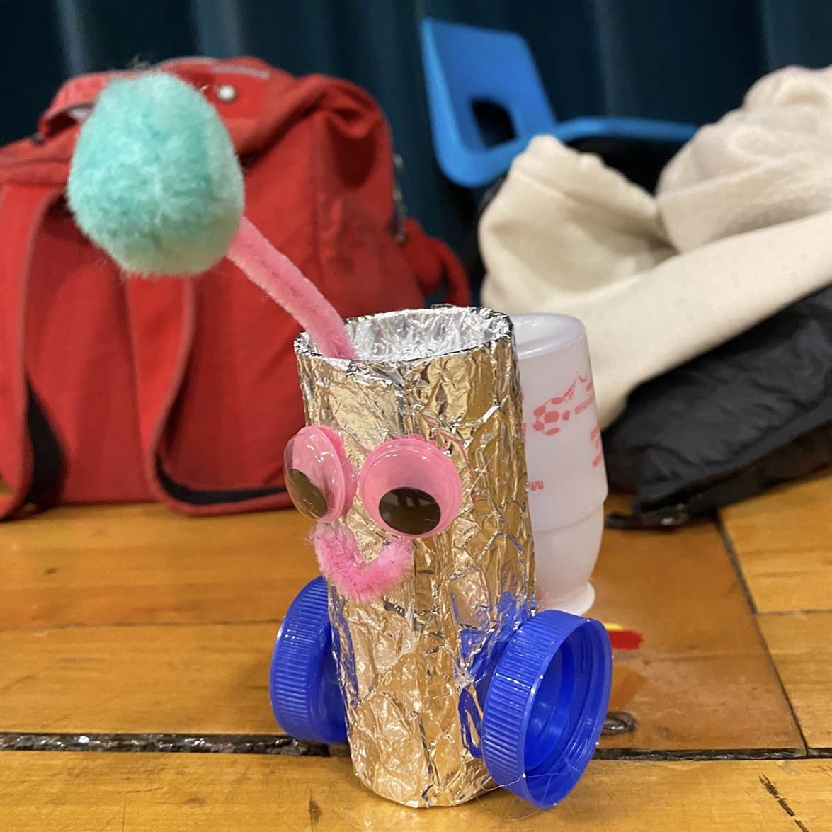 A toy made from recycled parts during MatSE grad student Edgar Mejia's bilingual polymer workshop with Cena y Ciencias at Leal Elementary School in Urbana, Ill.