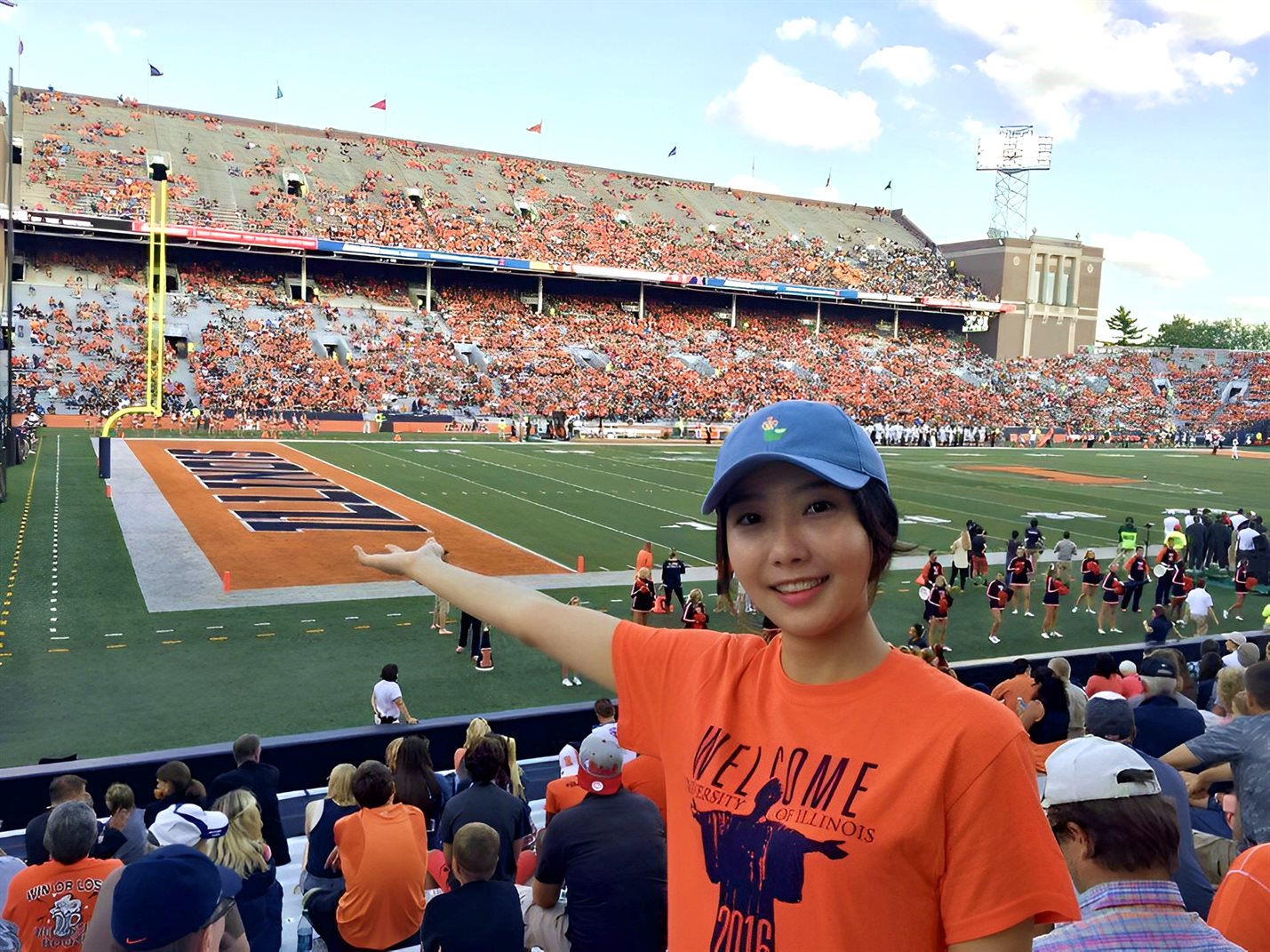 Ahyoung Kim attends her first Fighting Illini football game at Memorial Stadium in Champaign, Ill.