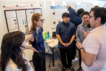 The MatSE biodegradable alternatives to styrofoam team fields questions during the annual presentation day held at the Campus Instructional Facility in Urbana, Ill. on May 5. Pictured, from left, are: Montse Solis, Sara Pfeil, R.J. Flores and Shawn Choi.