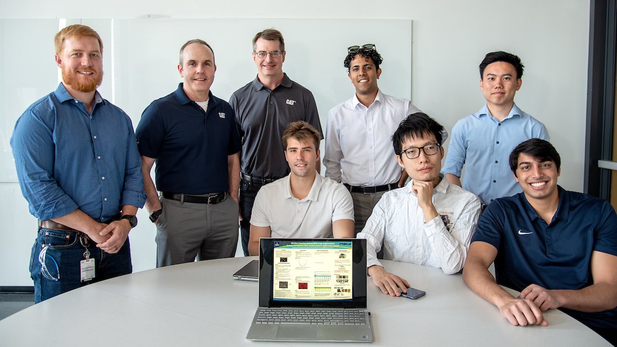 The Caterpillar-mentored Senior Design team poses for a photo during the annual presentation day at the Campus Instructional Facility in&nbsp;Urbana, Ill. on May 5. Pictured, back row, from left, are:&nbsp;Sam Buckholz, Caterpillar's senior engineer in Advanced Materials Technology; Rob&nbsp;Pickerill, Caterpillar's engineering manager of the Materials and Processing section of Advanced Materials Technology; and Mike Pershing, Caterpillar's senior technical steward for heat treatment; and MatSE seniors Vaanchit Srikumar and&nbsp;Eric Yang. Front row, from left are: MatSE seniors Tyler Ricks, Xianyang Chen and&nbsp;Atharva Atreya.