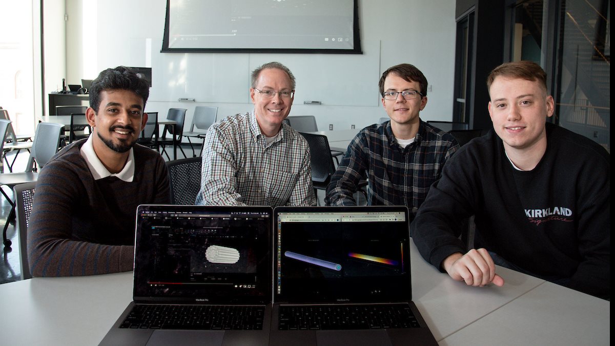 The materials selection for advanced electrical materials for transmissions lines team sponsored by 3M poses for a photo in the Campus Instructional Facility in Urbana, Ill. earlier in April. Pictured are MatSE teammates Akshay Subramani, left, Alexandru&amp;nbsp;Grindeanu, second from right, and Alex Meindl, right, who are joined by 3M's Matt Frye, second from left.