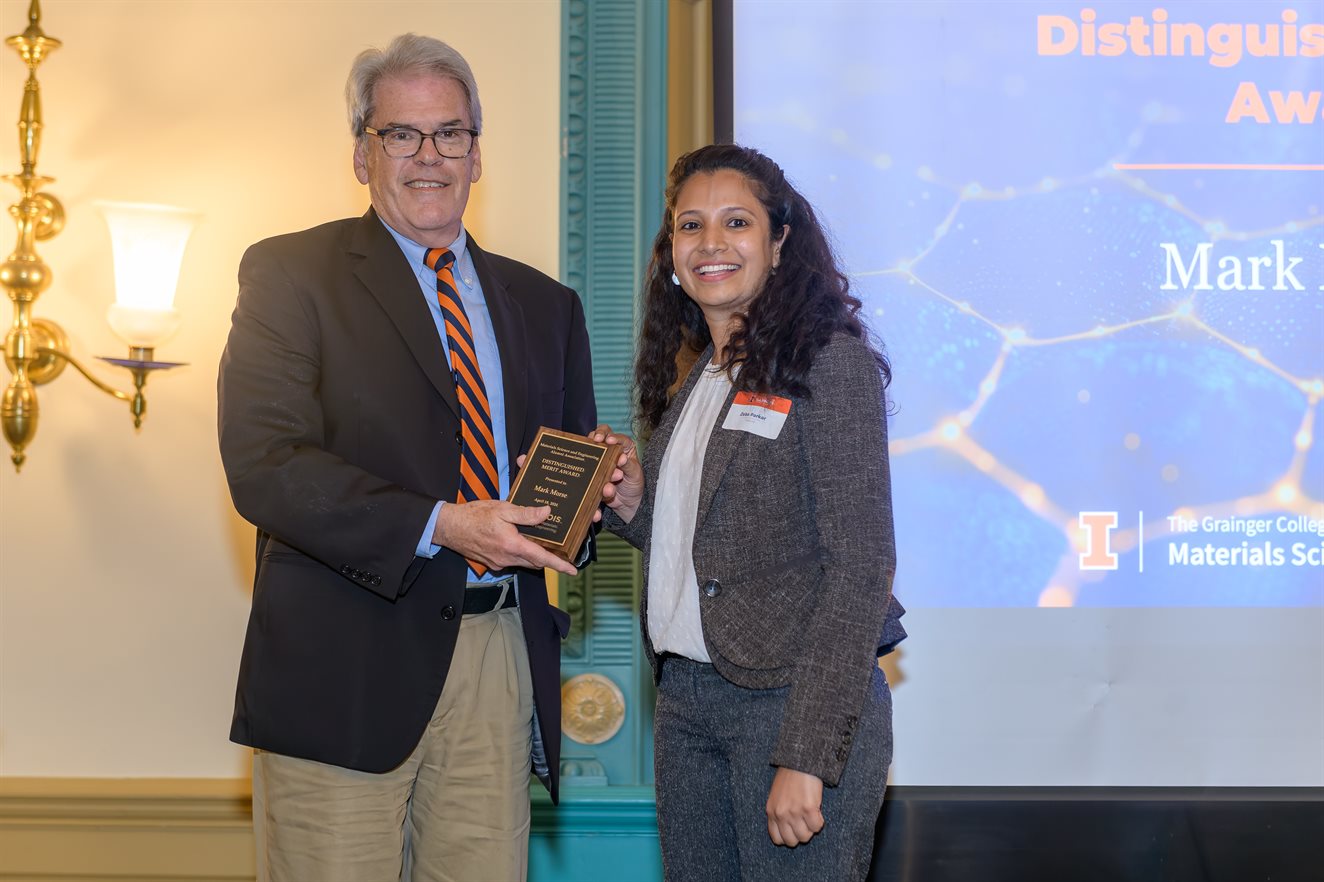 Mark Morse is pictured with MatSE alumna Zeba Parkar after receiving his Distinguished Merit Alumni Award. Morse, a 1977 University of Illinois graduate, boasts a decorated career involving decades of leadership and innovation in his work with materials.&amp;amp;amp;amp;amp;amp;amp;amp;amp;nbsp;